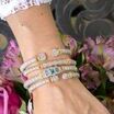 VAHAN's Trademark Moiré Beaded® pattern.
Made in the USA with domestic and imported materials