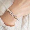 VAHAN's Trademark Moiré Beading® and Crown Petals
Made in the USA with domestic and imported materials