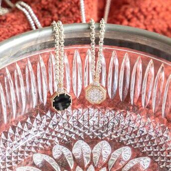 Diamonds or black onyx? Well with this pendant you can have both 