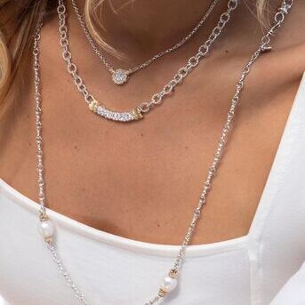 Not sure how to layer necklaces? Choose ones with different lengths and chains. This stops them fro