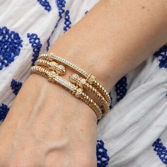 Gold is always a good idea. Adorn your wrist with an allgold stack  Get this stack or create your o