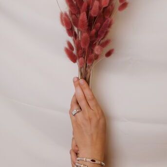 Compliment your outfit with the warmth of Garnet. Fiery and passionate, the Garnet stone is a gem y