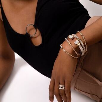 A  vibe stylish and sophisticated. Adorn your wrist with our stunning two tone bracelets mixed with