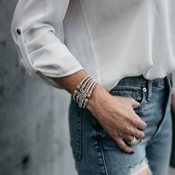 Your favorite jeans, a fabulous white shirt, and impeccably styled VAHAN Jewelry... The timeless lo